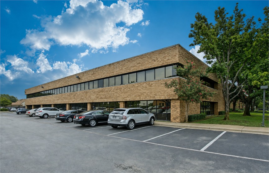 Exterior of a modern FTKR technical facility in daylight.